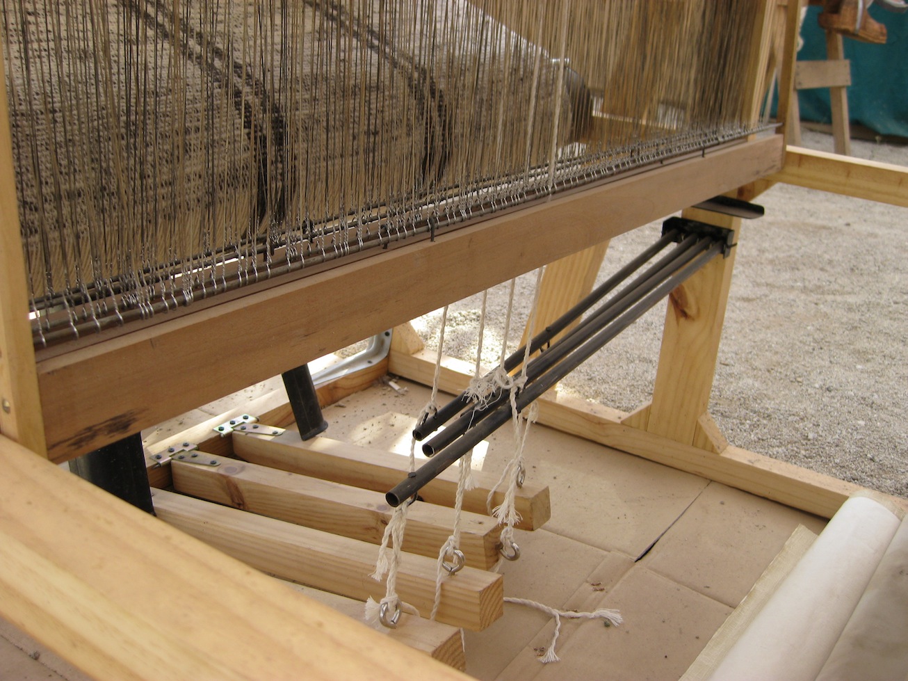 Foot-treadle floor loom for weaving