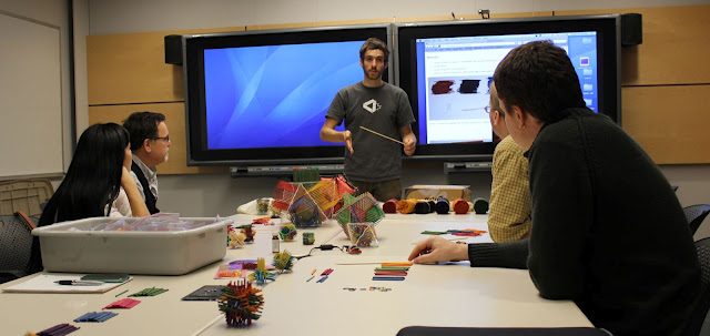 Alejandro Erickson, training Math Catcher volunteers.